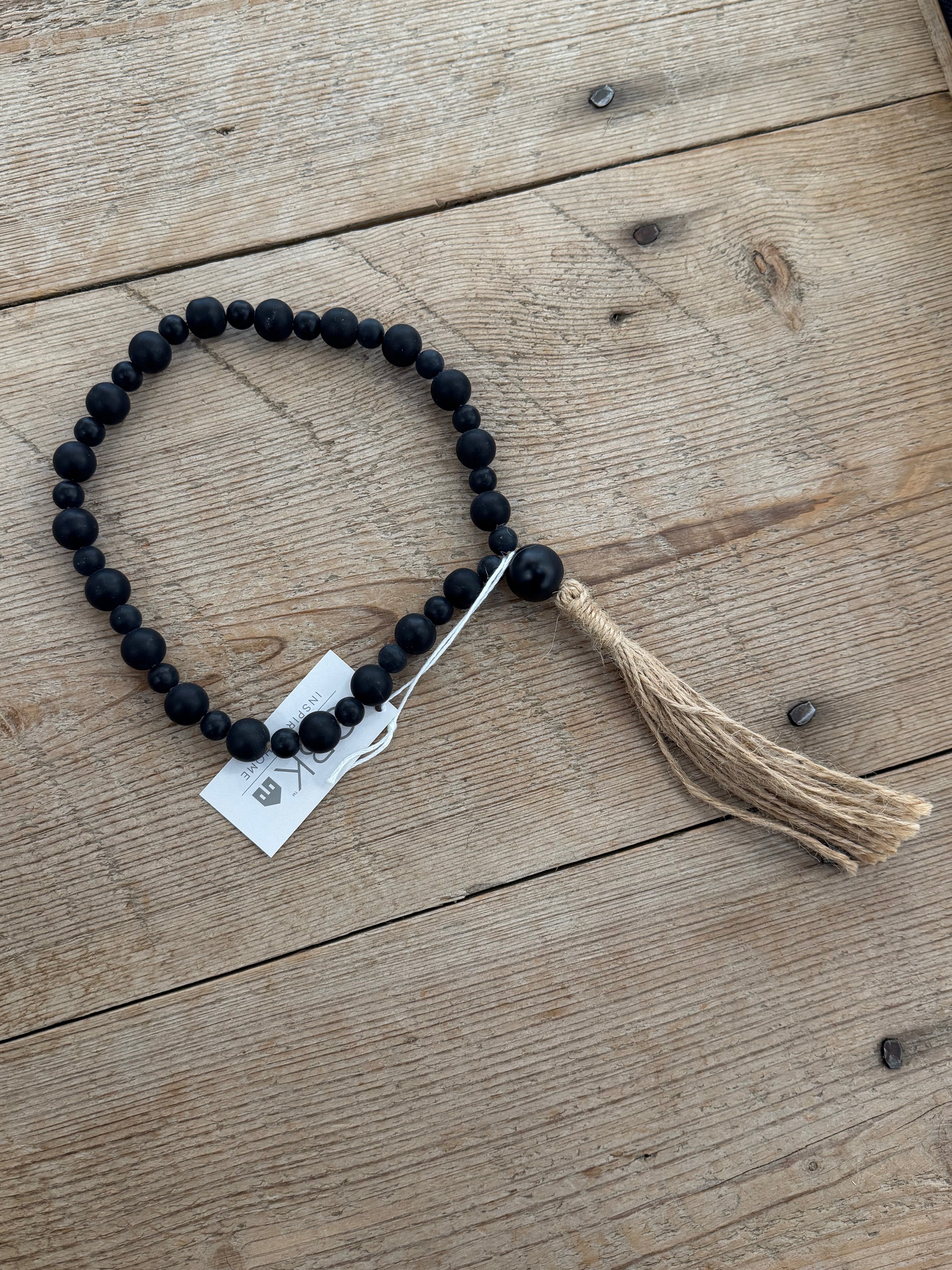 Black Bead Tassel Glass